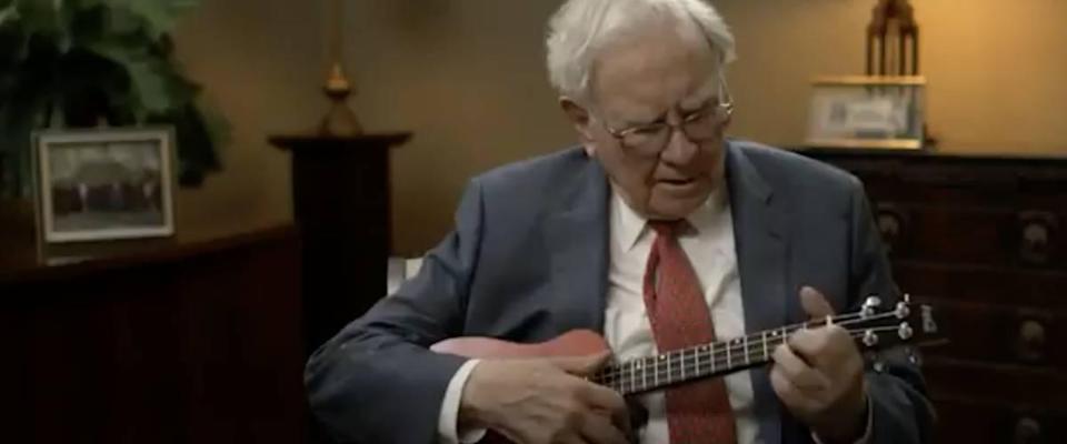 Warren Buffett playing ukelele