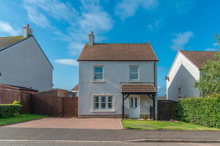 Typical Scottish Modern Detached Three Bedroomed Villa Constructed Ten Years Ago and Situated within a Scottish Housing Estate