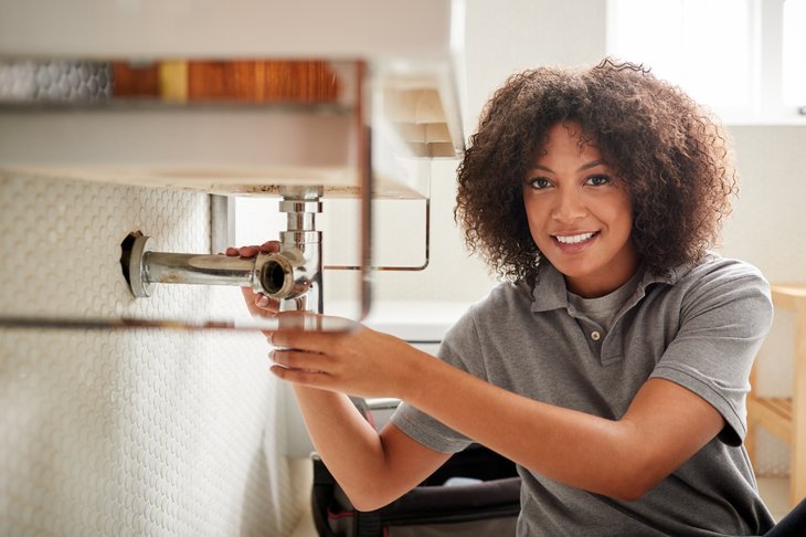 Woman plumber